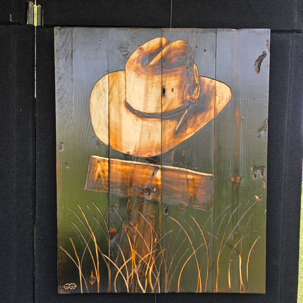 Cowboy hat on cross